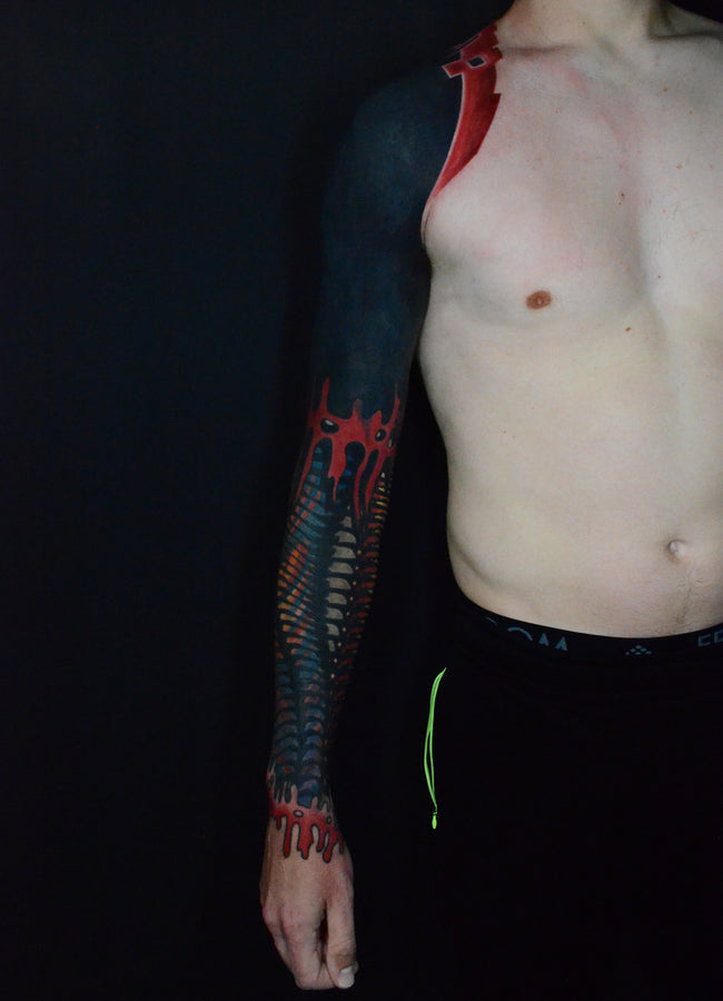 bioorganic industrial blackout tattoo – cover up with contrasting industrial pattern and color