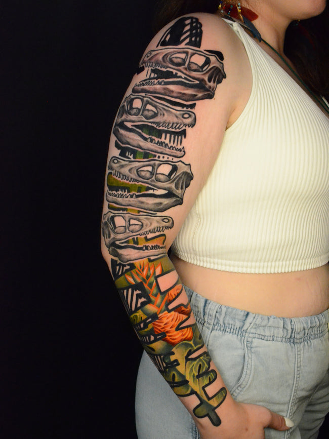 bioorganic industrial color sleeve – velociraptor skulls with floral elements in industrial pattern