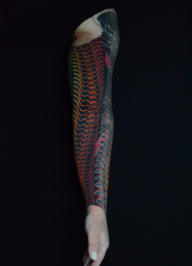 bioorganic industrial sleeve tattoo – dotwork industrial pattern and contrasting colors inspired by natural structures