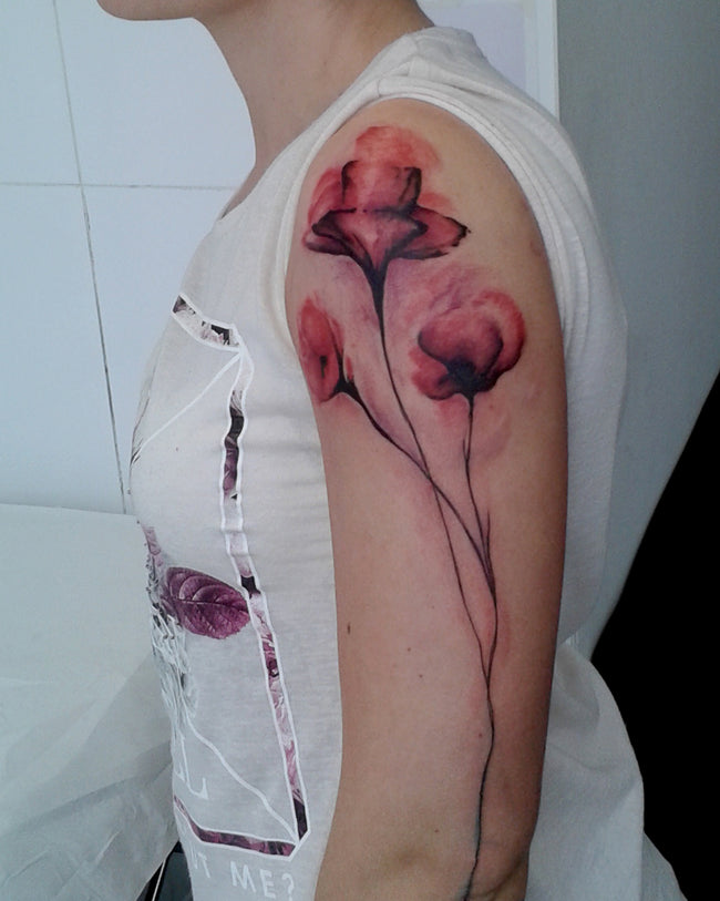 watercolor poppy flower tattoo – near sleeve coverage in full color