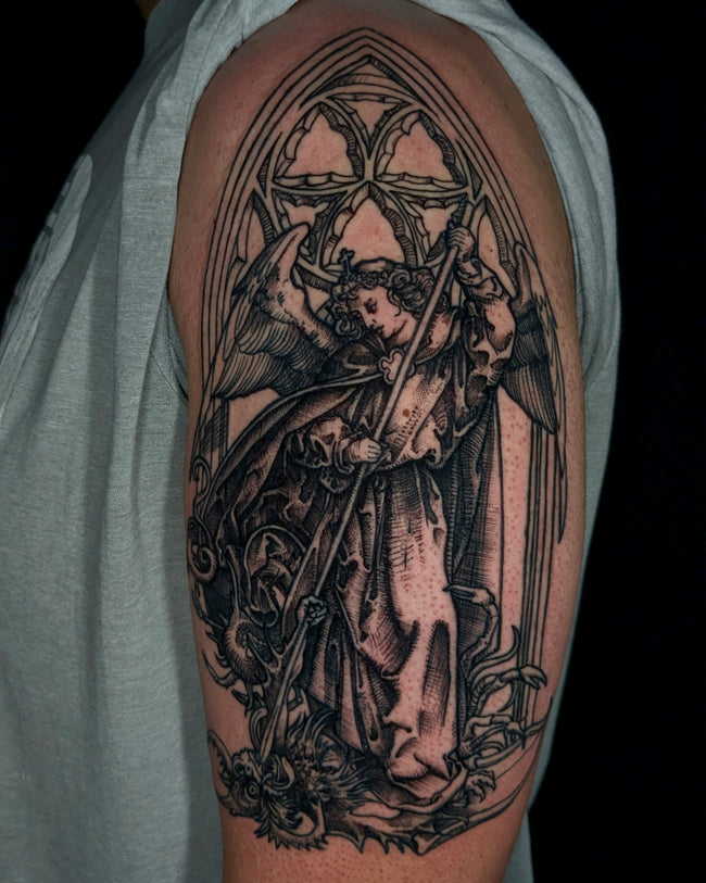 illustrative angel vs devil tattoo – black and grey composition inspired by St Michael engraving by Martin Schongauer